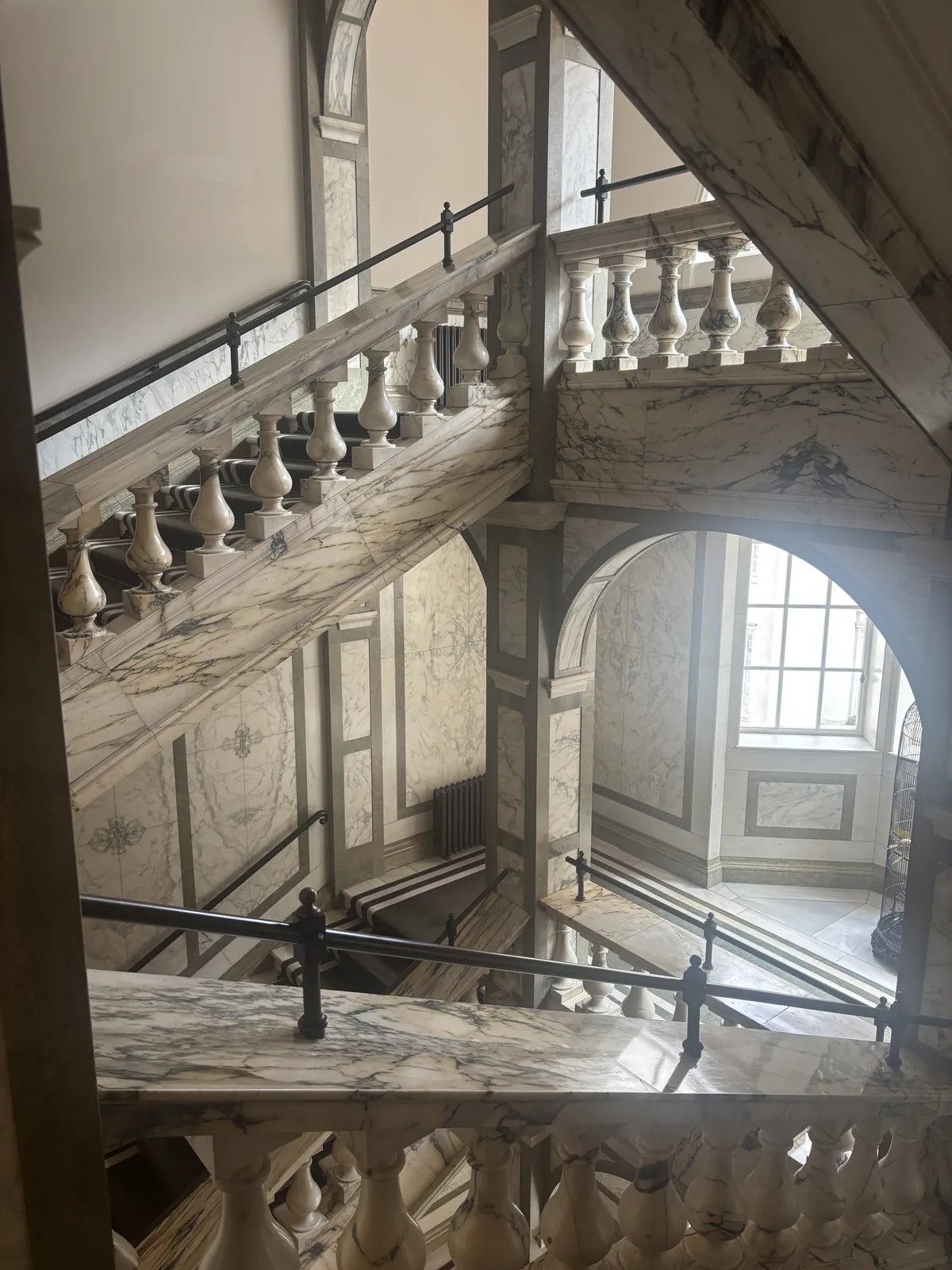 Pavonazzo marble staircase at Rosewood London