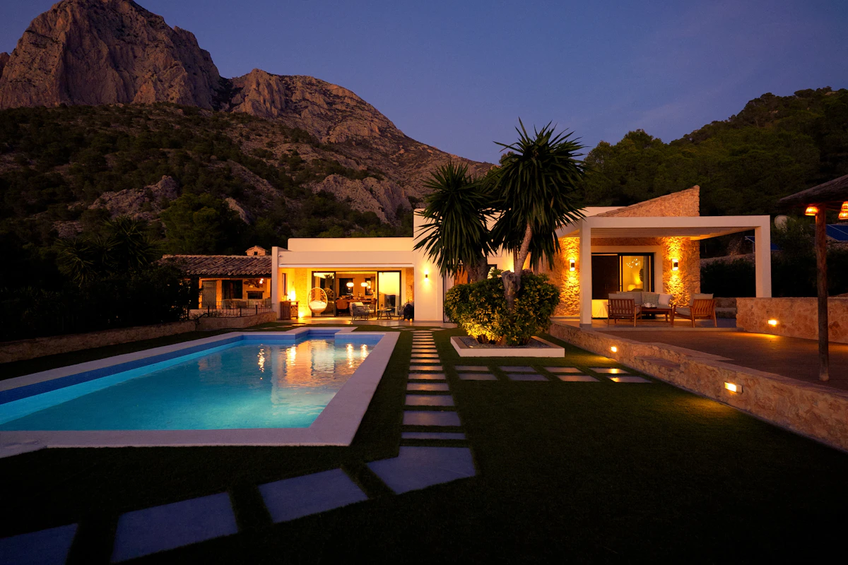 Private villa pool at dusk